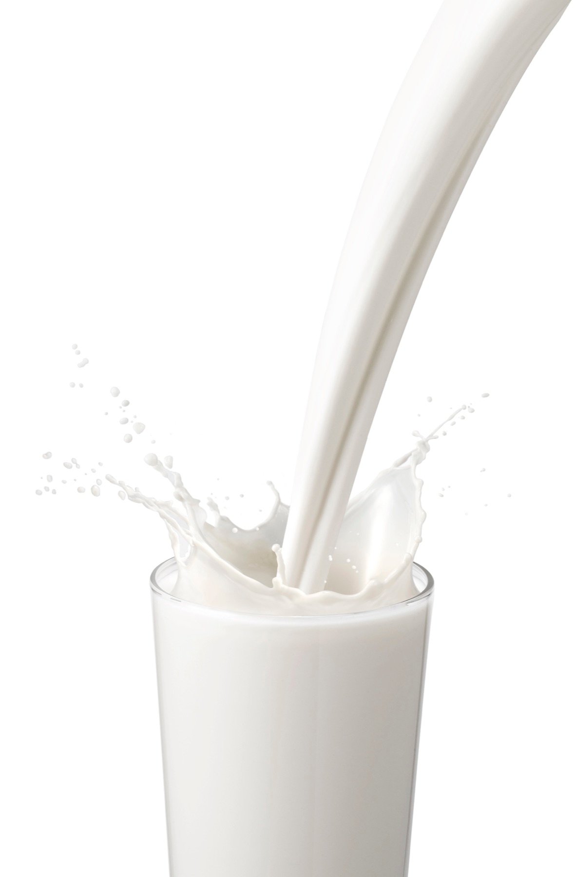 Milk pouring into a glass for a beverage campaign