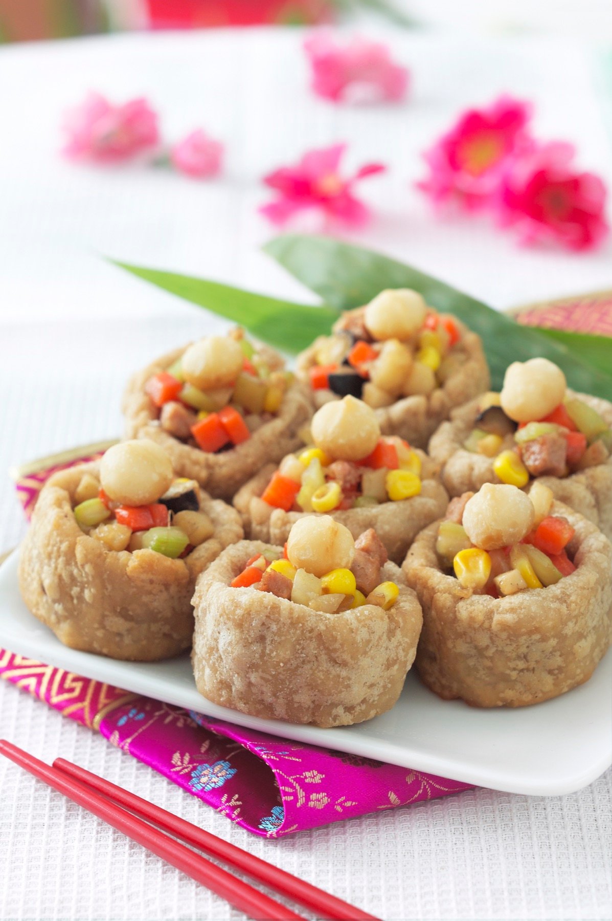Bite-sized savoury pastries with garnish