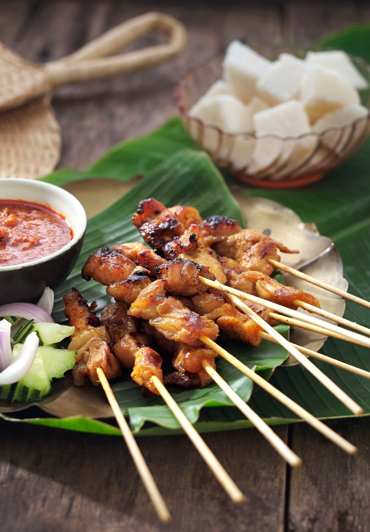 Grilled skewers served with fresh greens
