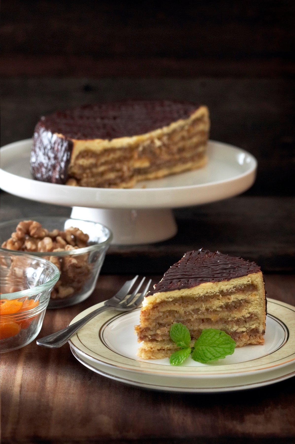 A slice of chocolate cake served on a plate