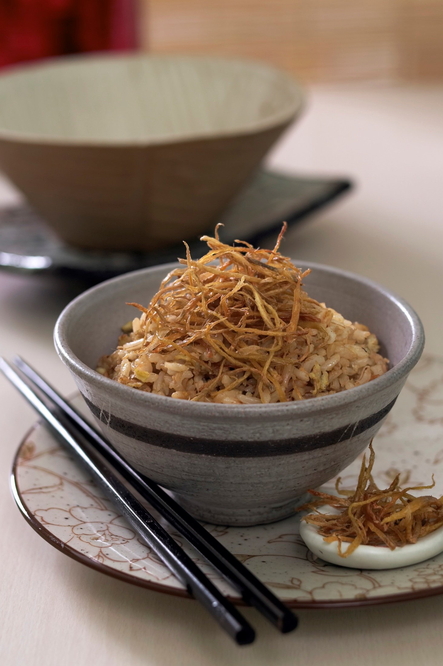 A savoury bowl topped with crisp garnish