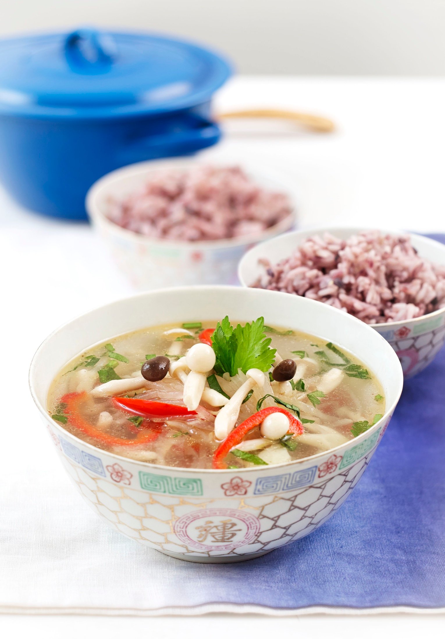 Soup bowls arranged with side dishes