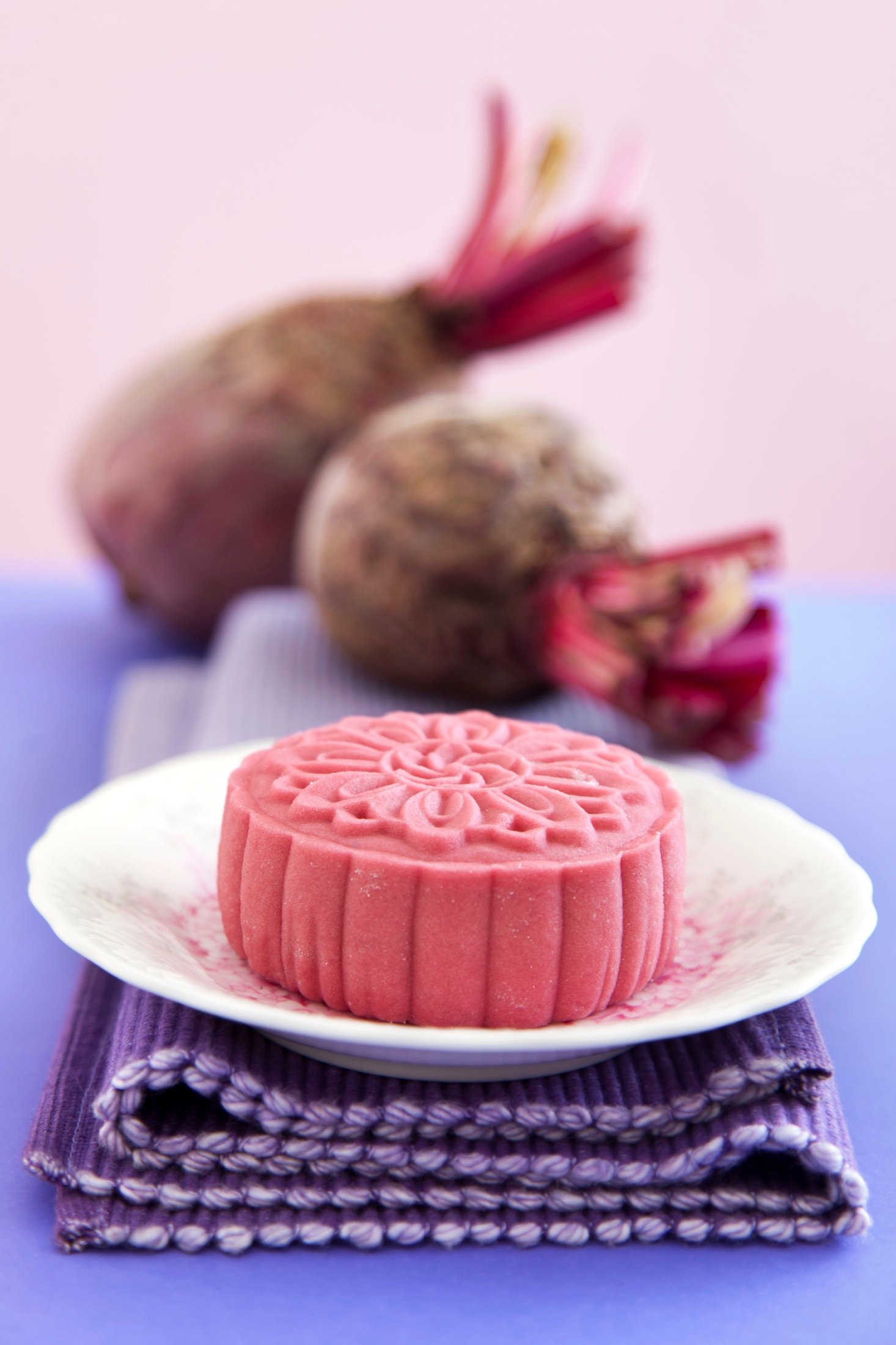 A festive mooncake styled with seasonal props