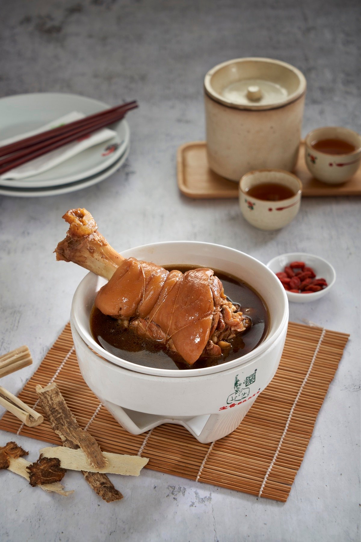 A plated Malaysian meal with fresh accompaniments