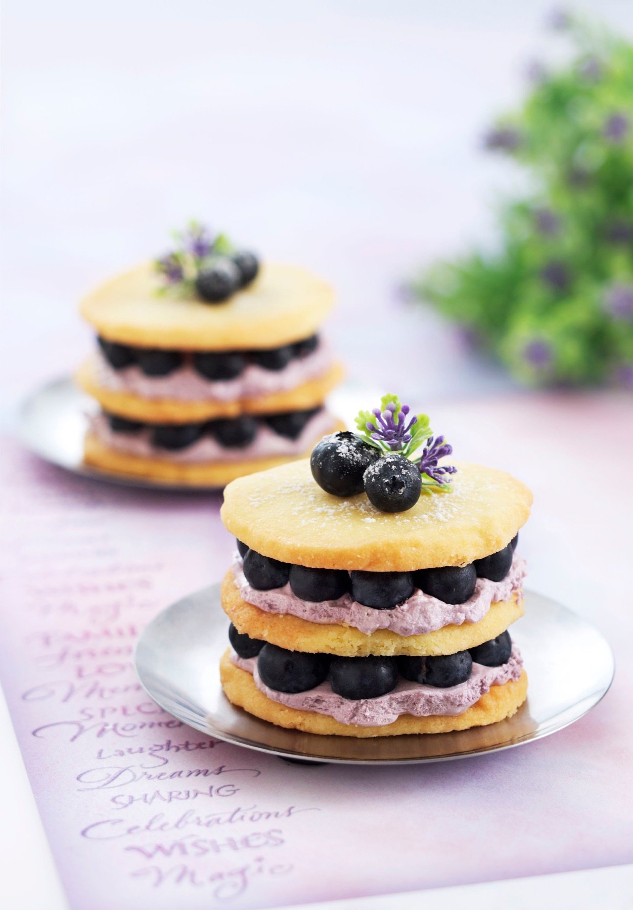 Pancakes topped with berries and cream