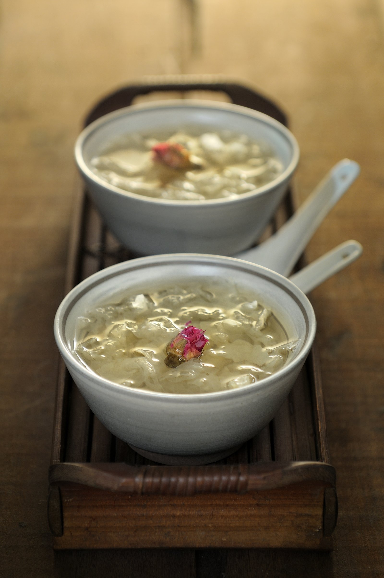 Two bowls of traditional Chinese soup
