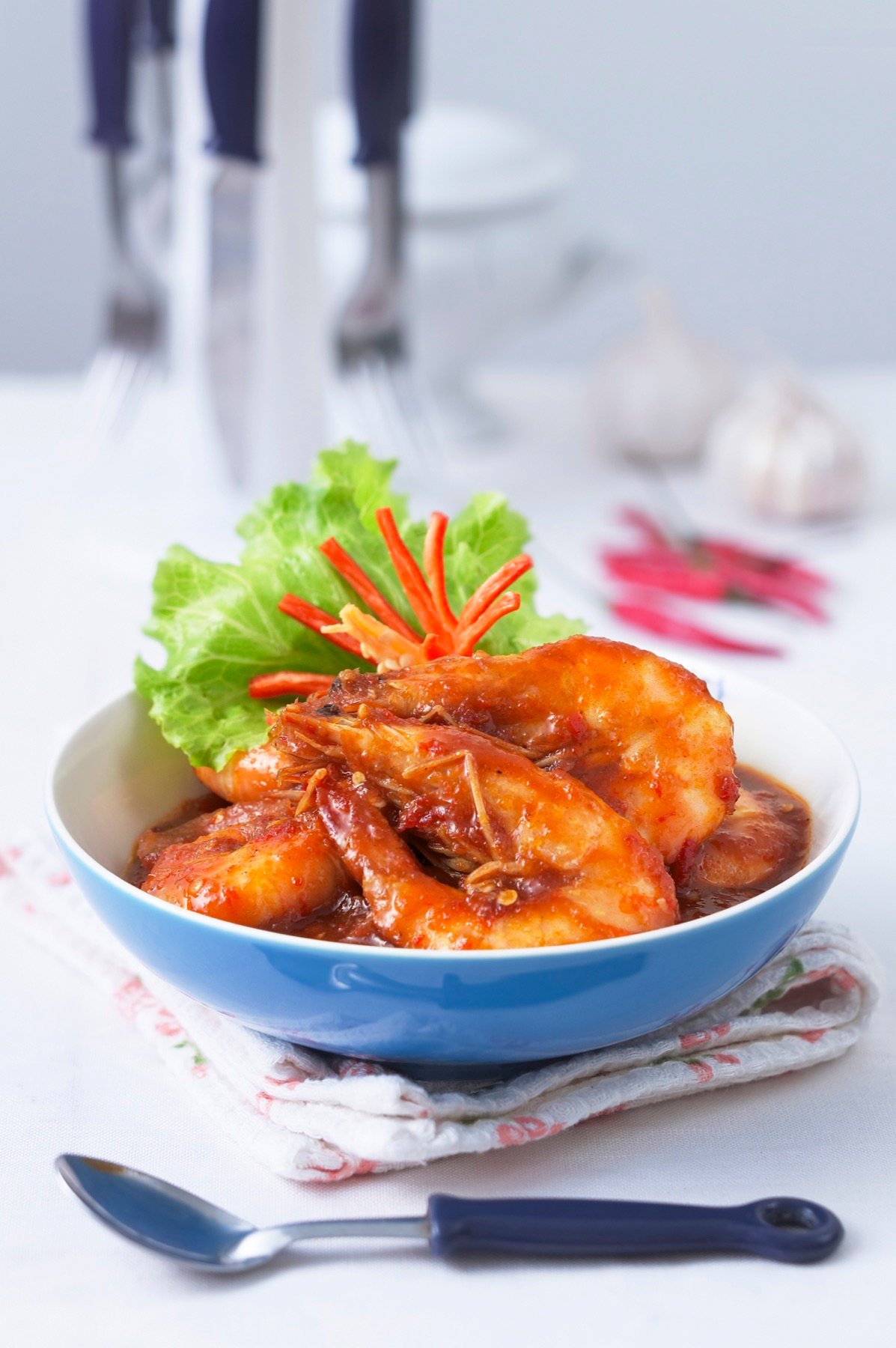 A glazed chicken dish served with vegetables