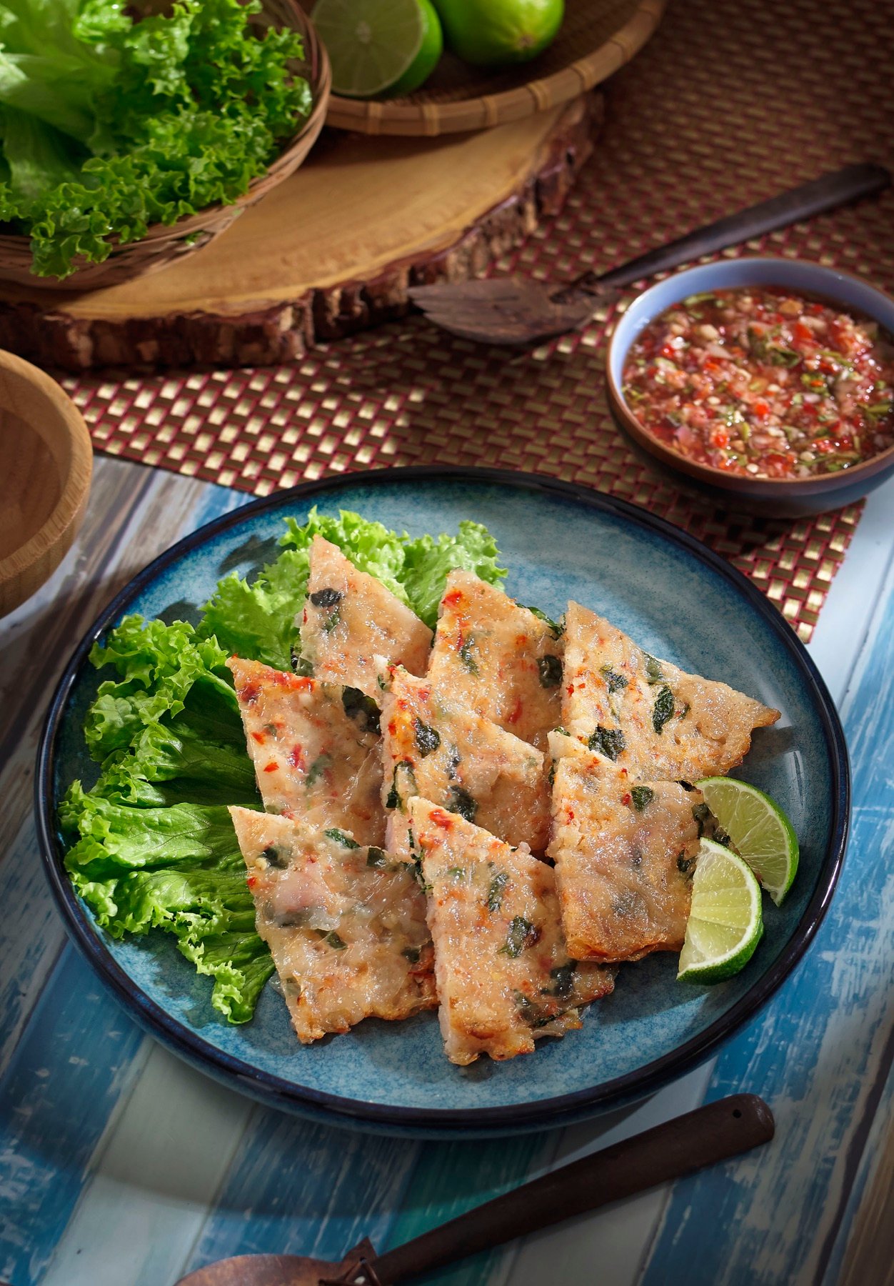 Grilled fish served with greens