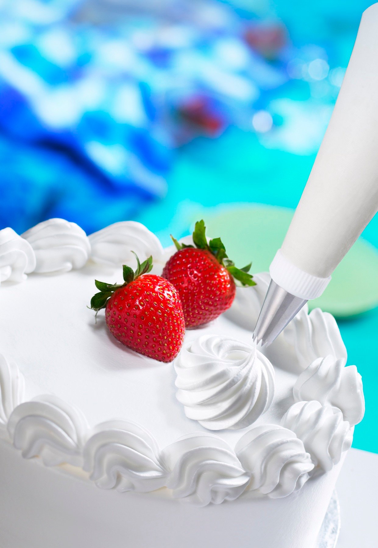 A berry tart topped with whipped cream