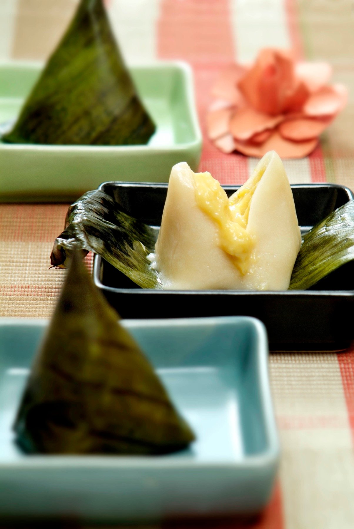 A selection of dumplings in a divided tray