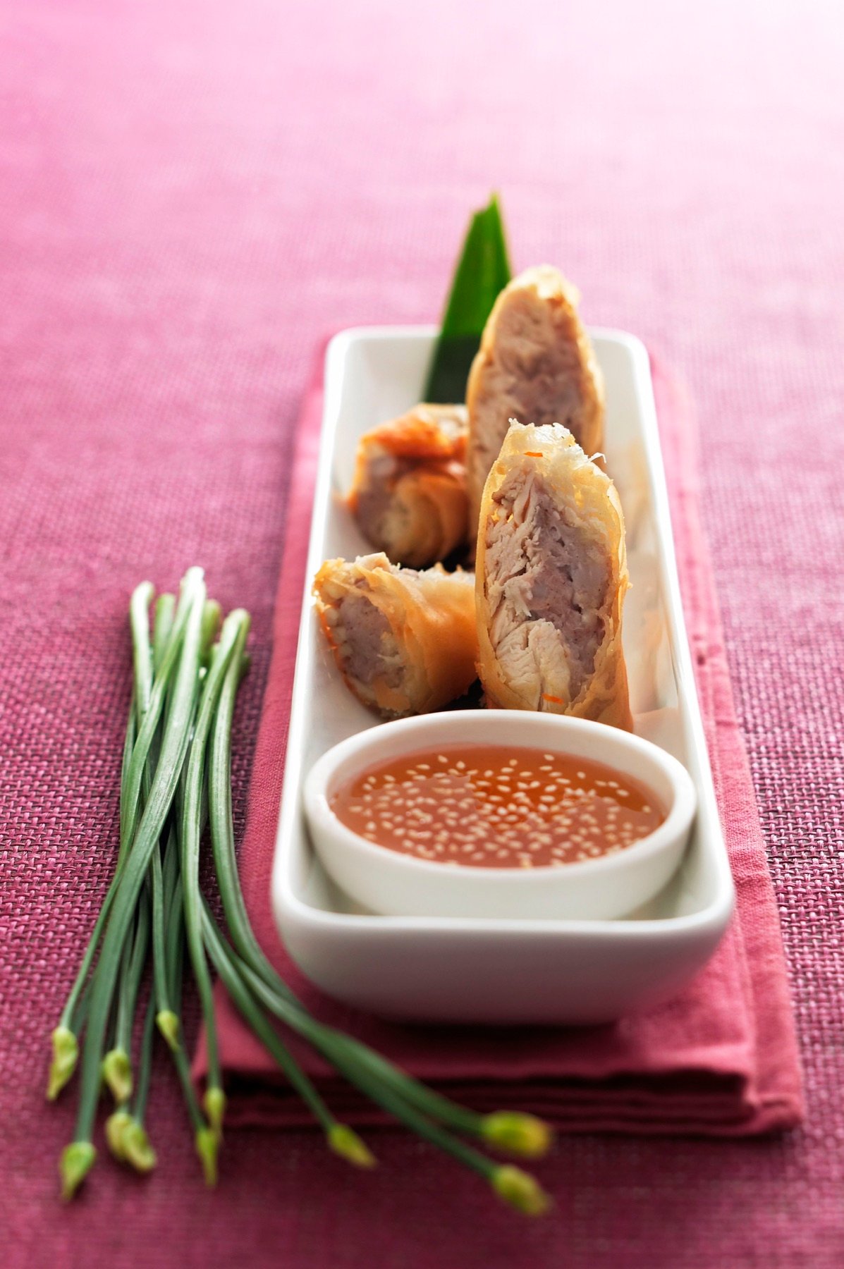 A plated meal with vegetables and dipping sauce