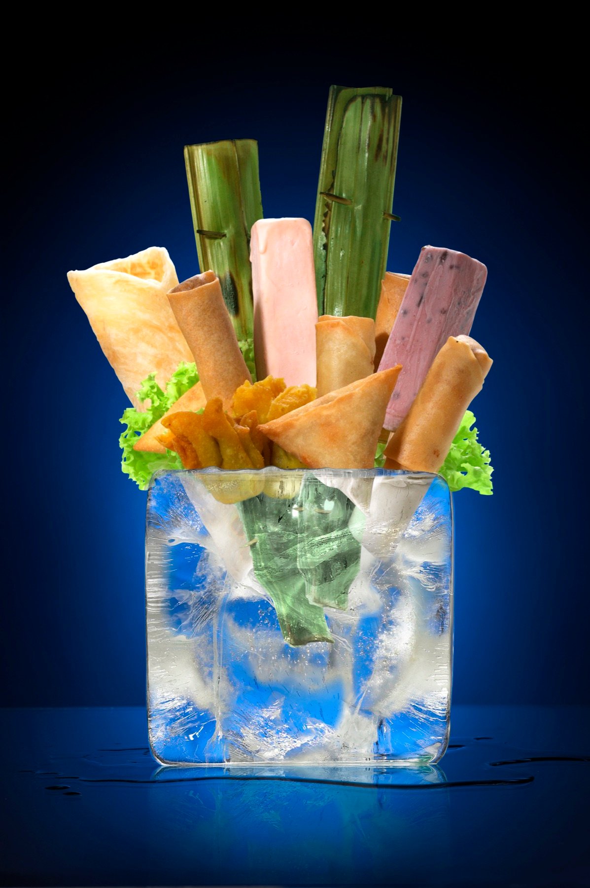 Golden rolls arranged in a tall glass