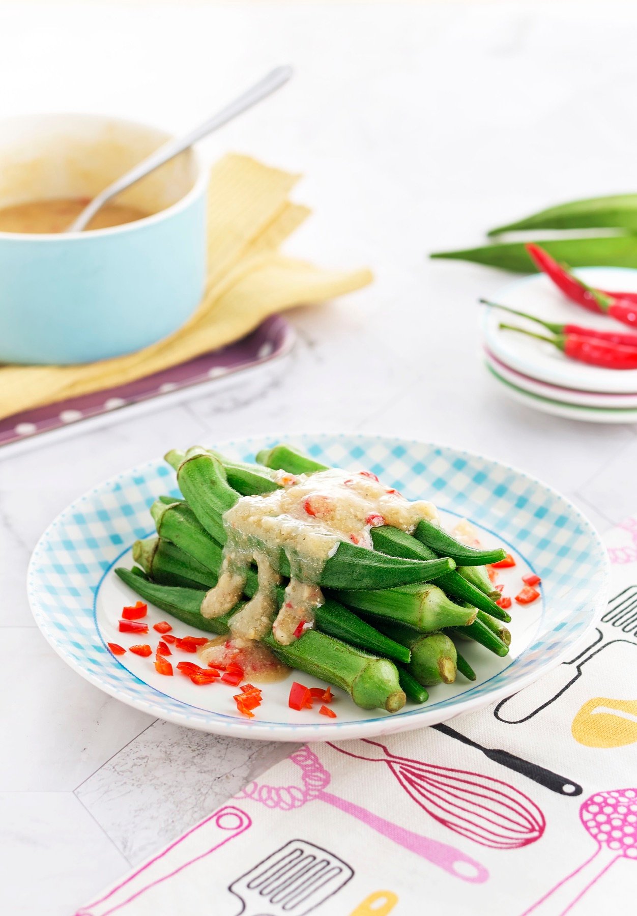 Green vegetables served on a white plate