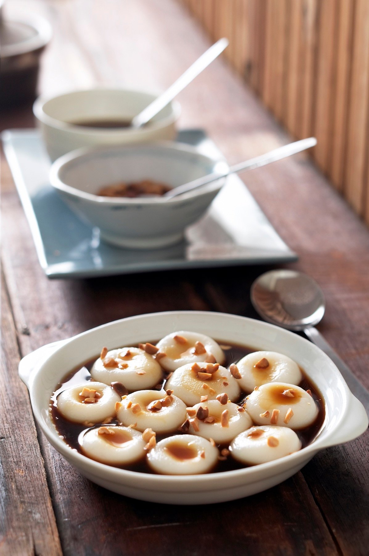 A selection of savoury bites arranged in ceramic bowls