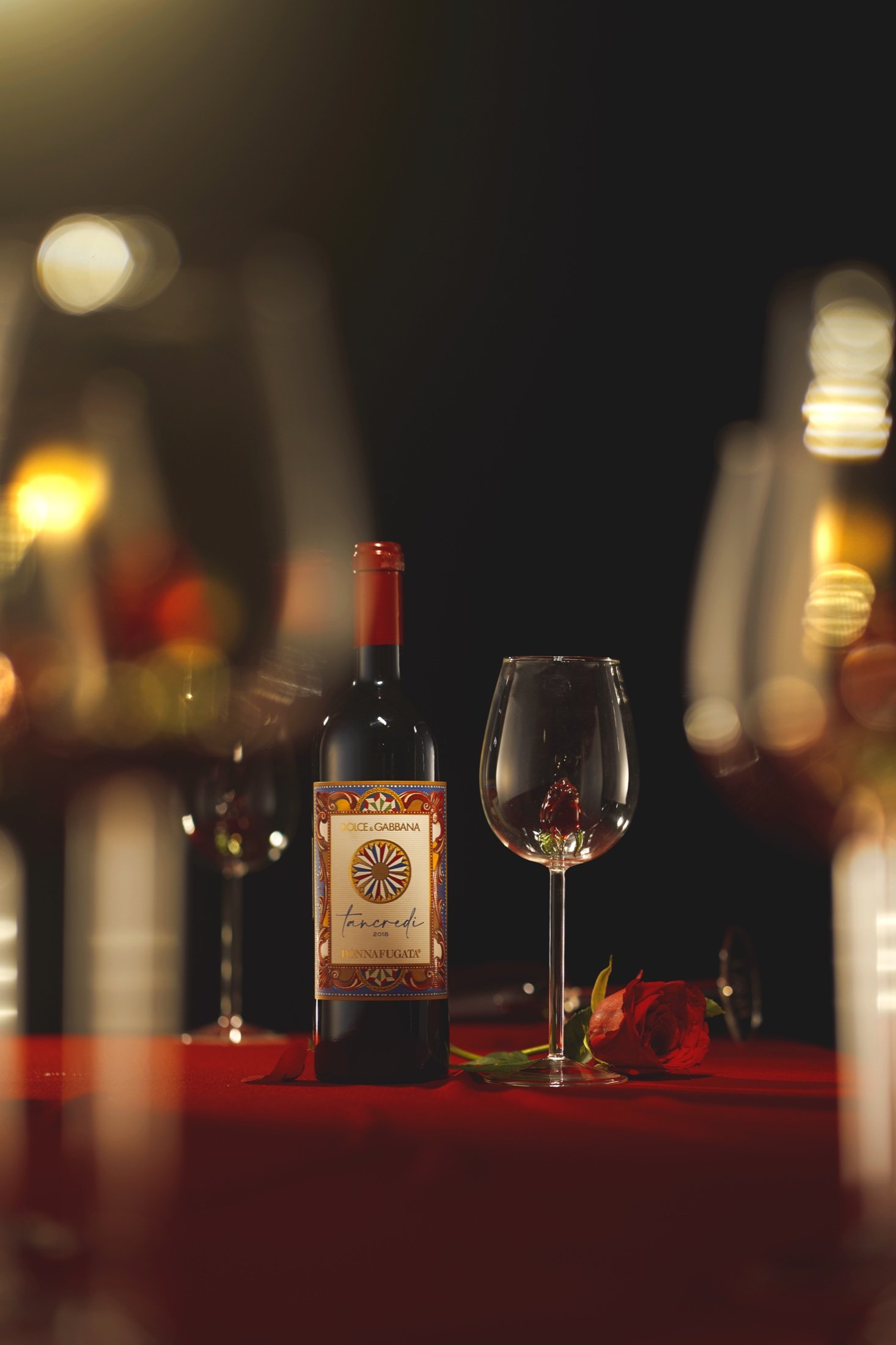 A bottle styled with glasses for a product campaign