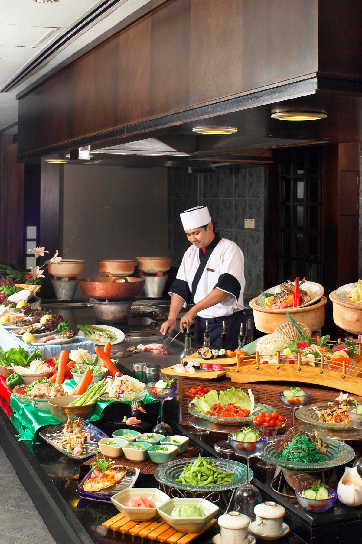 A hotel buffet with dishes prepared for service