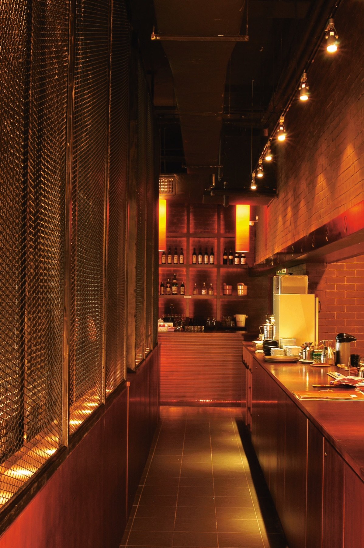 A softly lit restaurant corridor